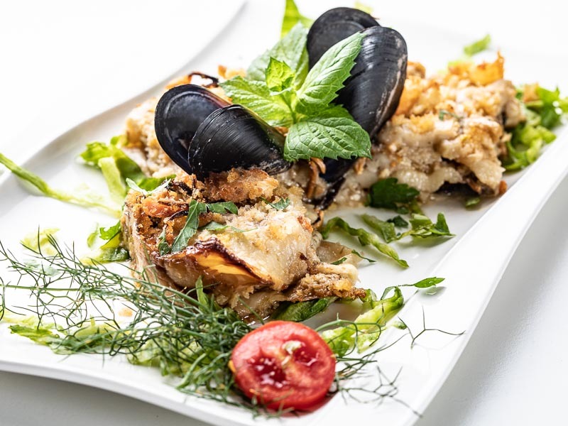 Eggplant parmigiana with seafood