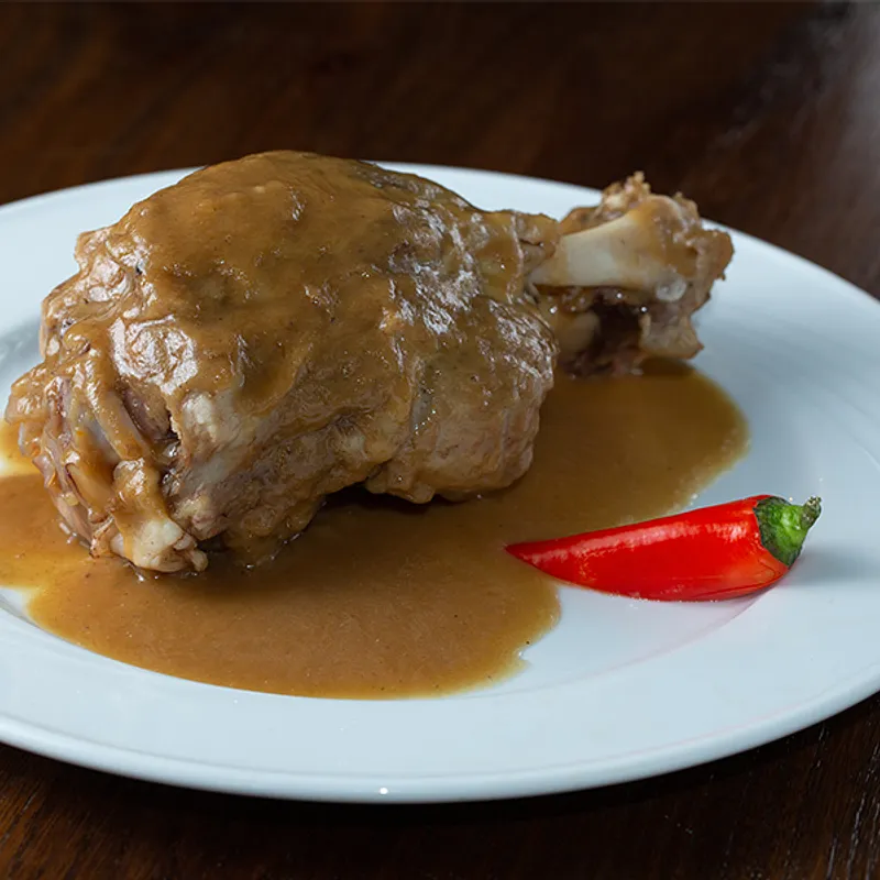 Stinco di maiale con birra e mele — Unni Don Nino - Osteria Bar, Sant'Angelo di Brolo (photo 1)